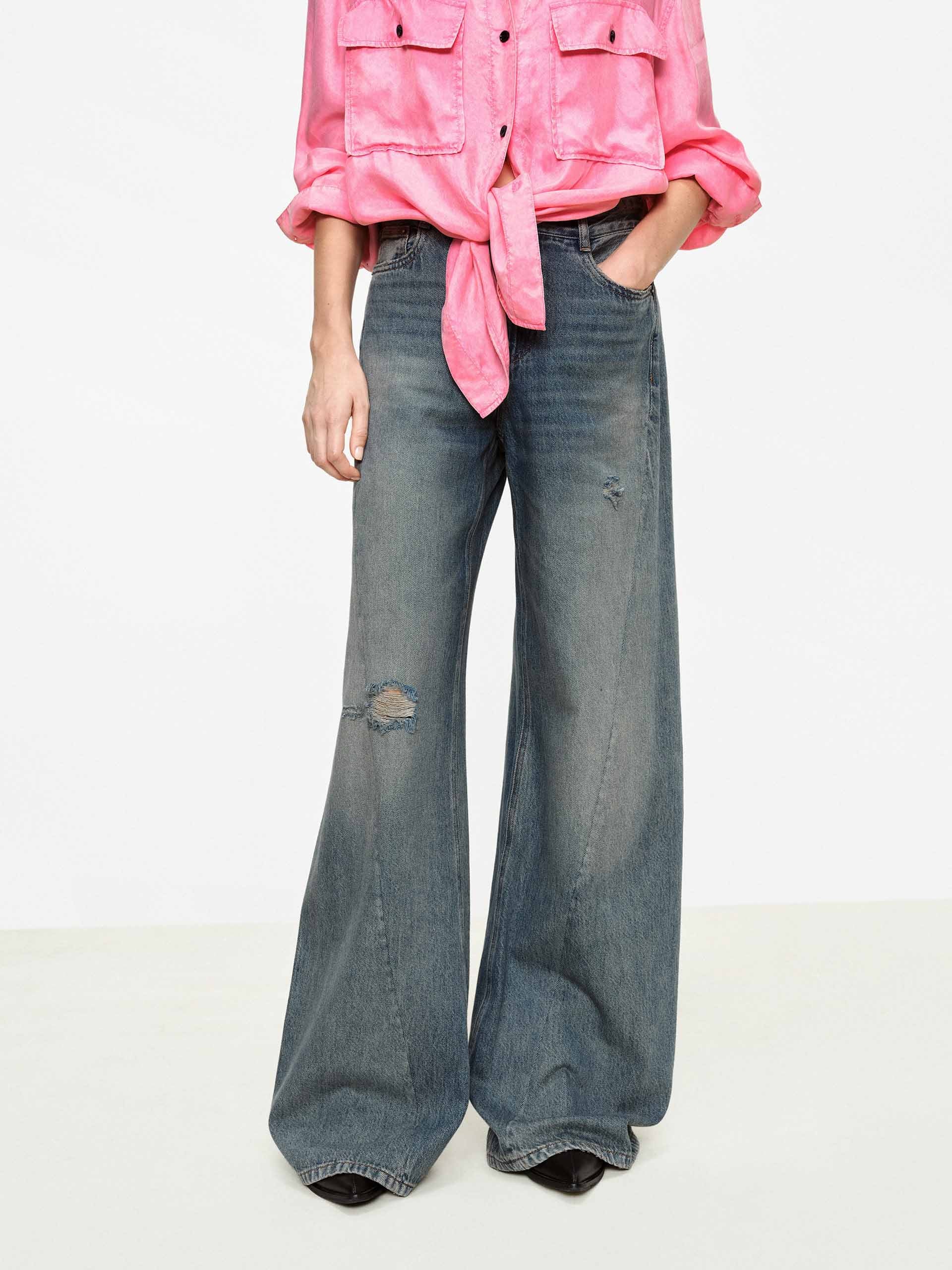 Ripped Cotton Blend Jeans